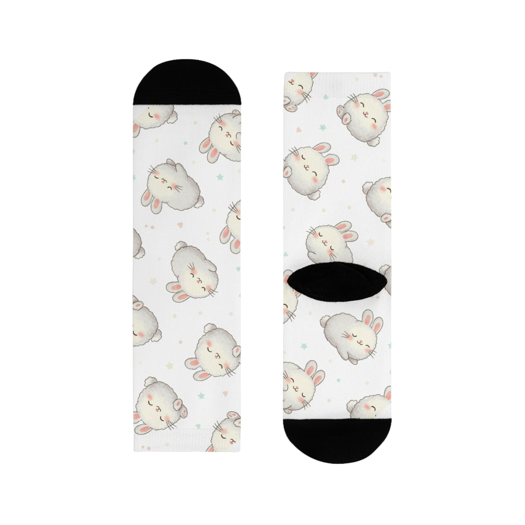 Two socks with cute animal pattern on a white background